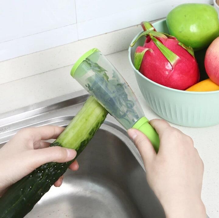 Pelador de acero inoxidable con recipiente